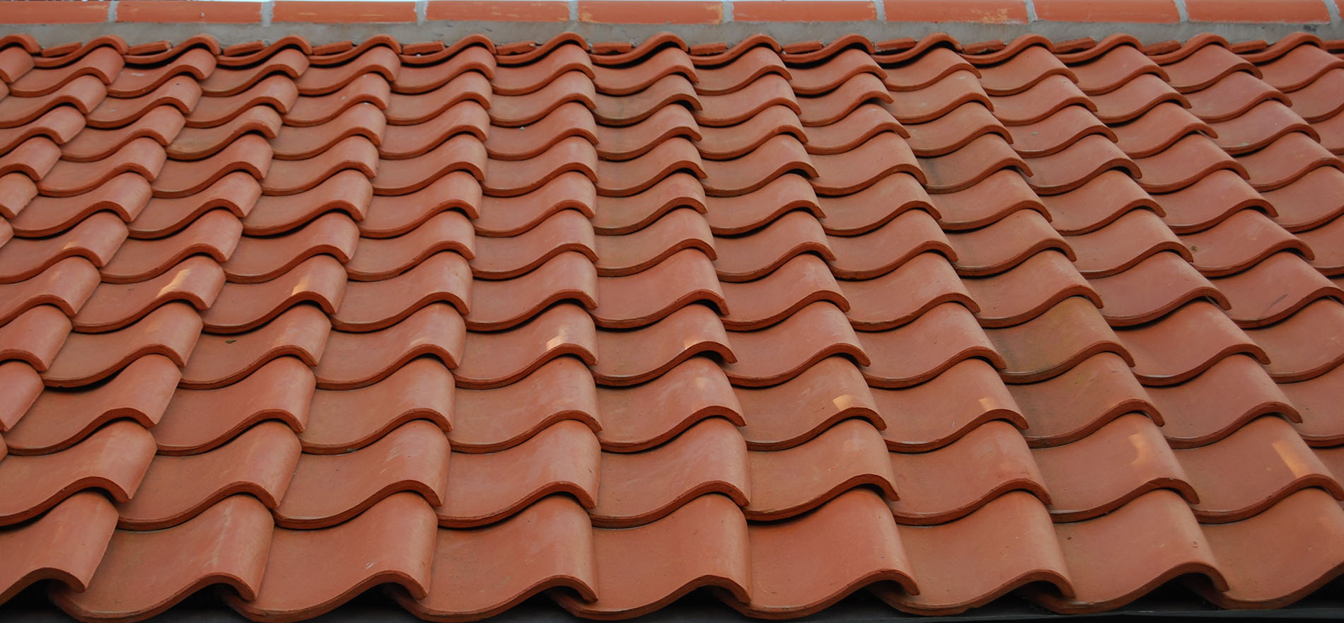 Close-up texture of S-curve pantile roof tiles
